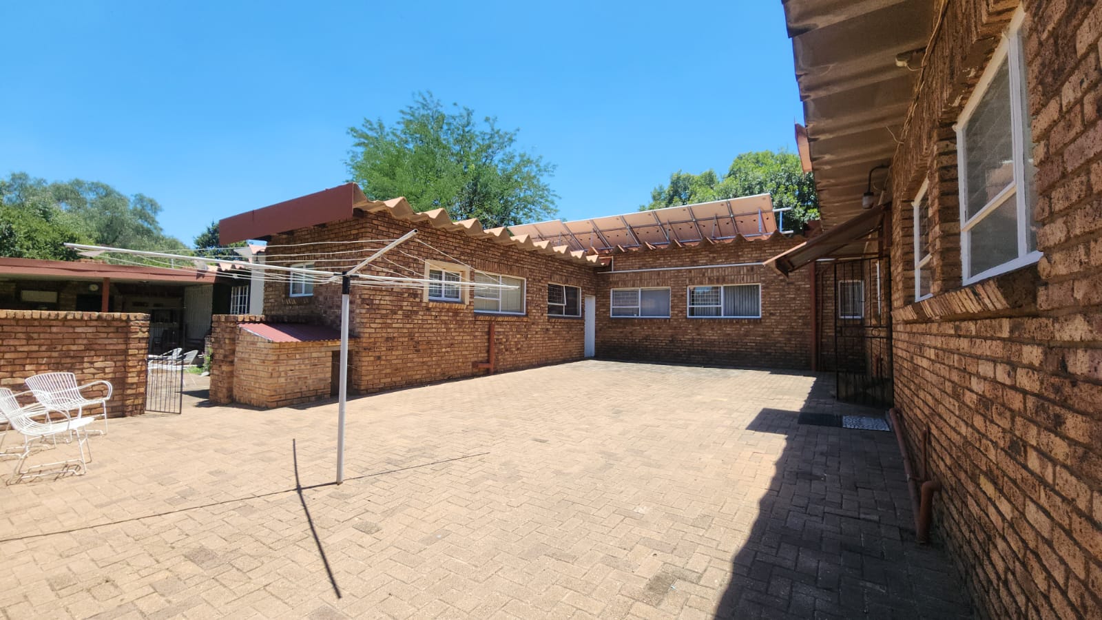 INNER COURT AT BACKDOOR OF KITCHEN