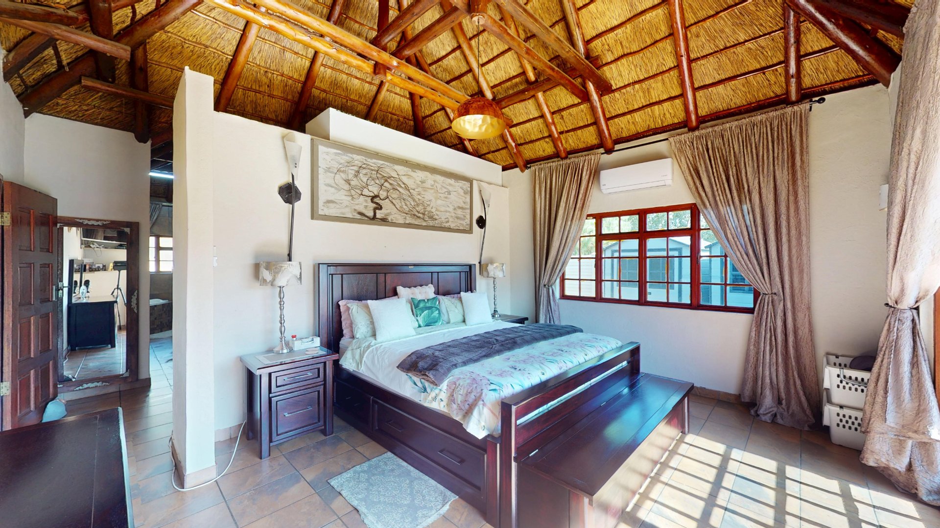 MAIN BEDROOM WITH EN SUITE BATHROOM AT THE BACK