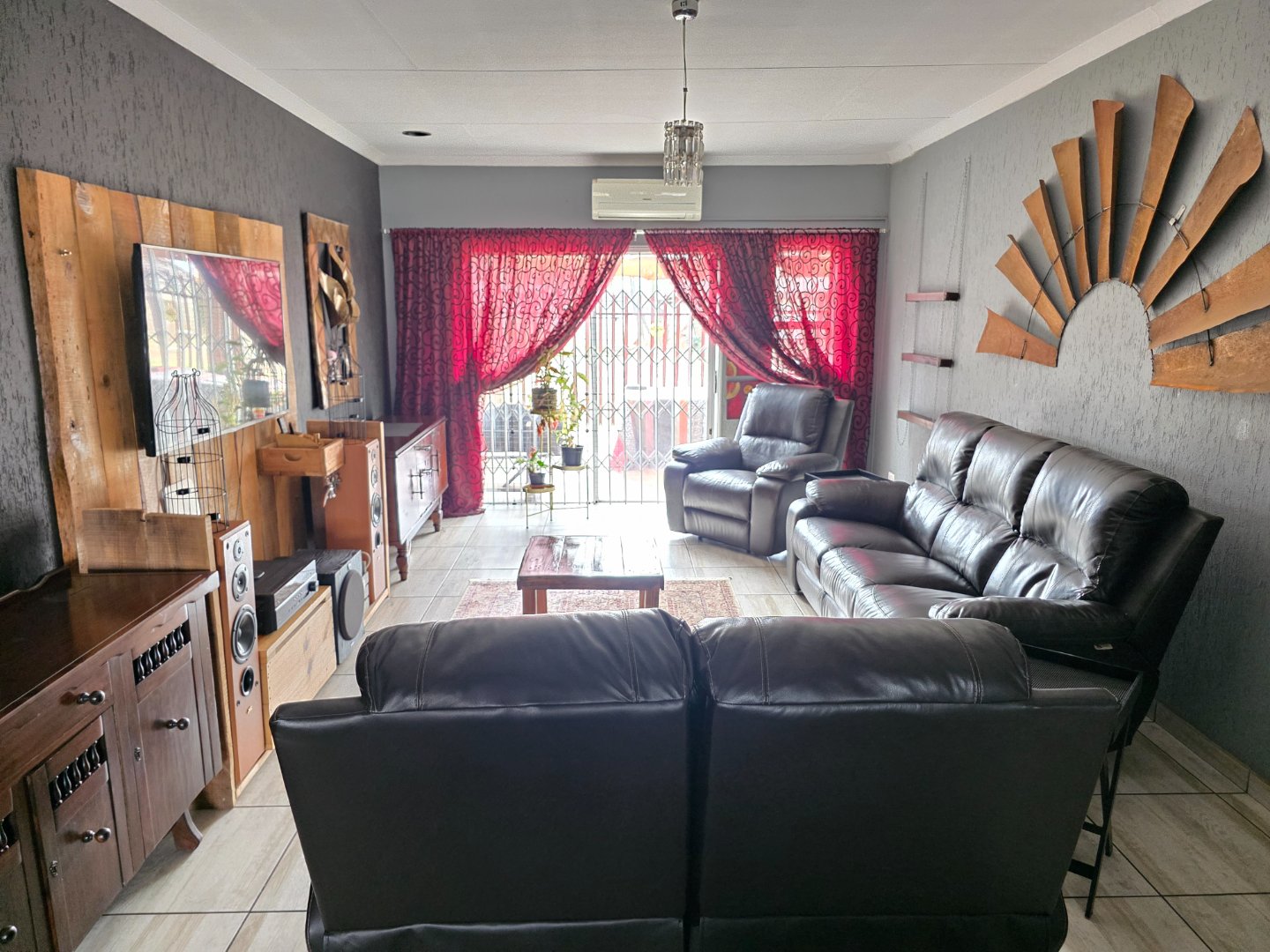 TV ROOM WITH DOORS TO OIUTSIDE