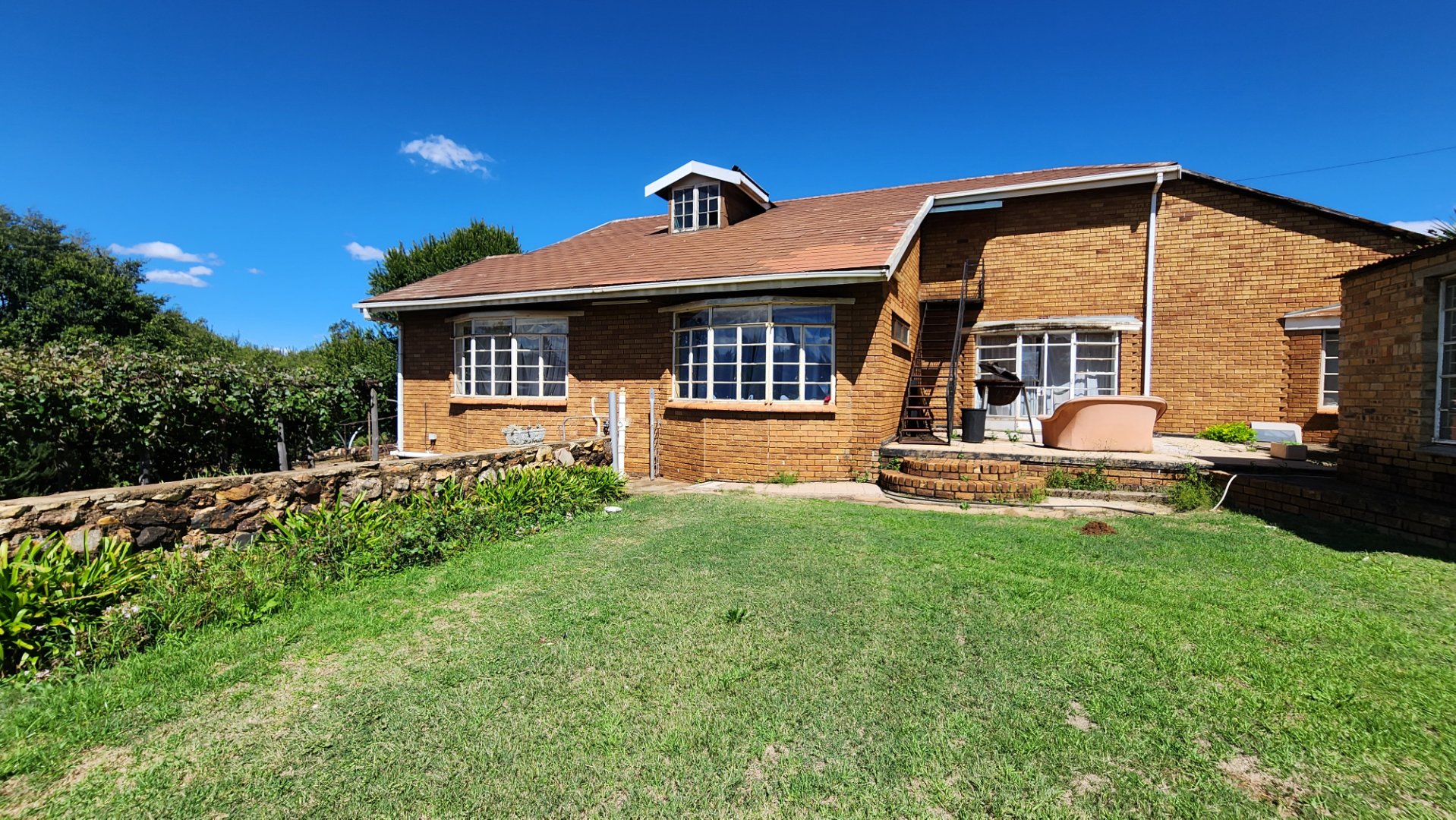 BACK VIEW OF MAIN DWELLING
