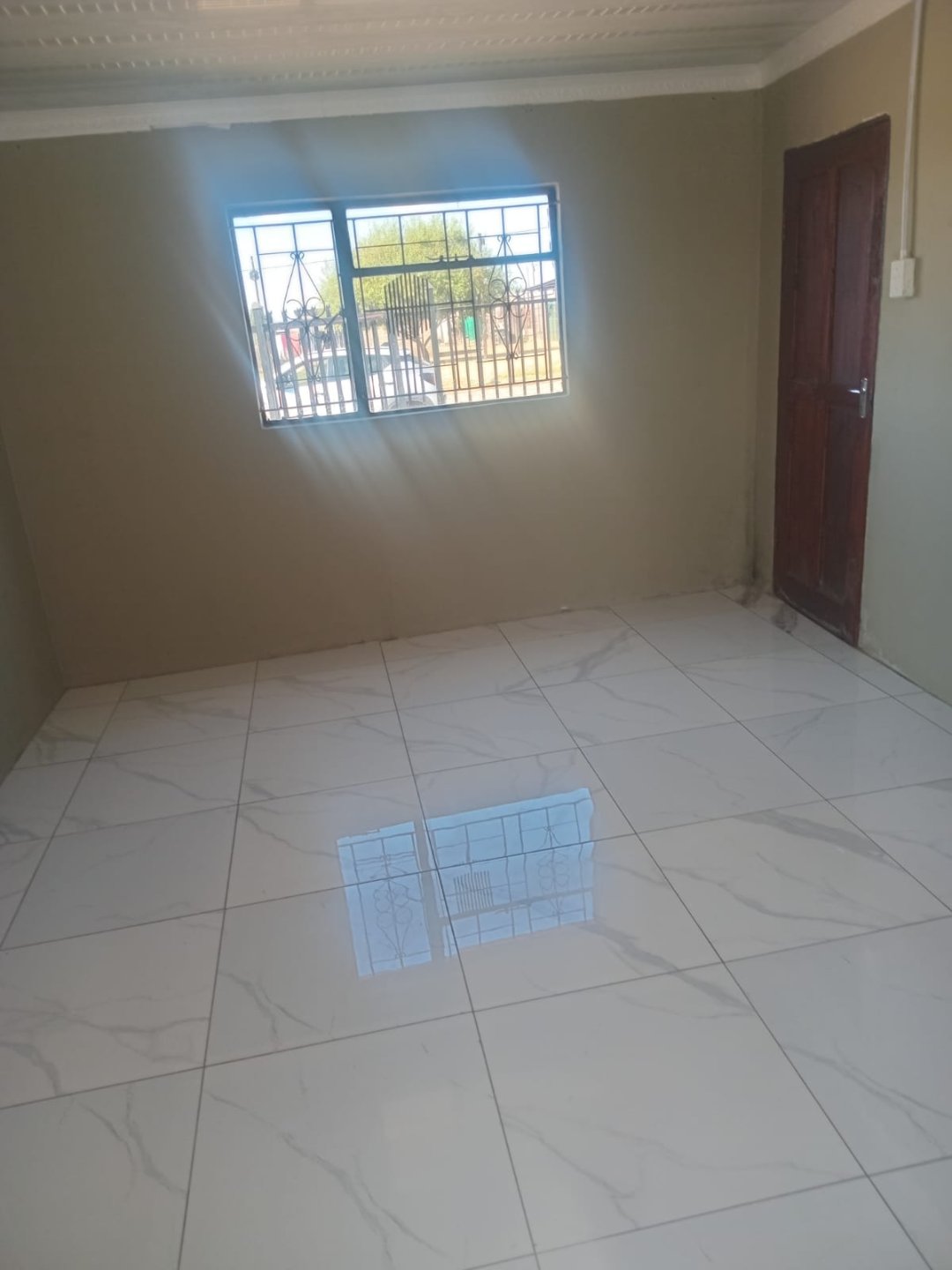 Renovated 2-Bedroom Home with Open-Plan Living in Bloemside Phase 5 photo 2