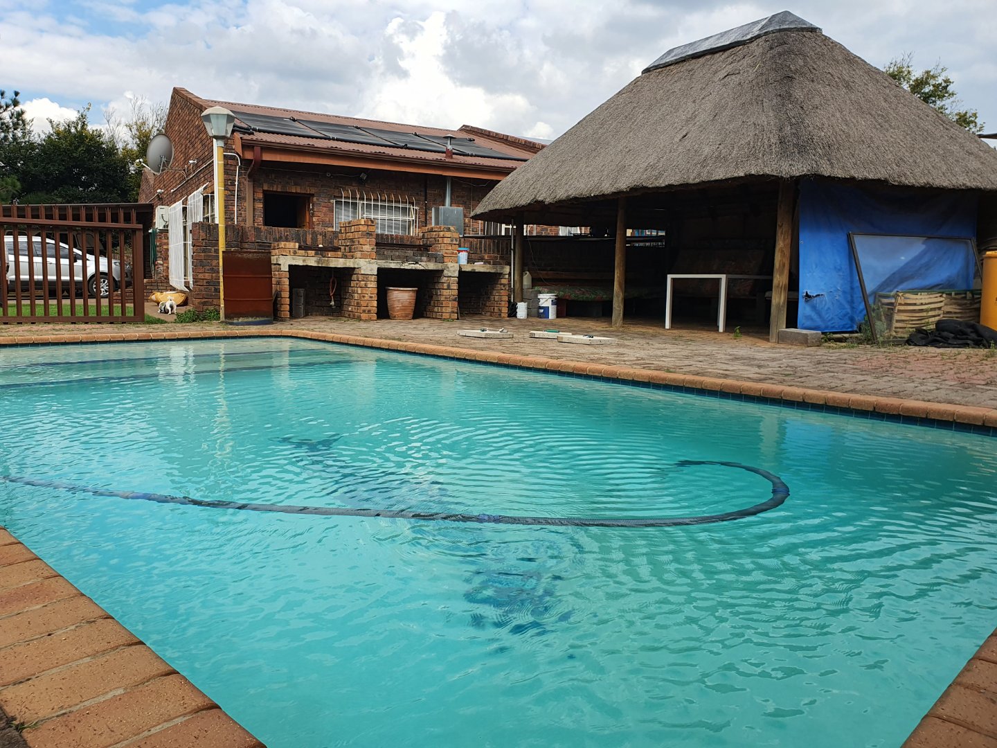 Spacious home with two flats, solar power, and great entertainment.