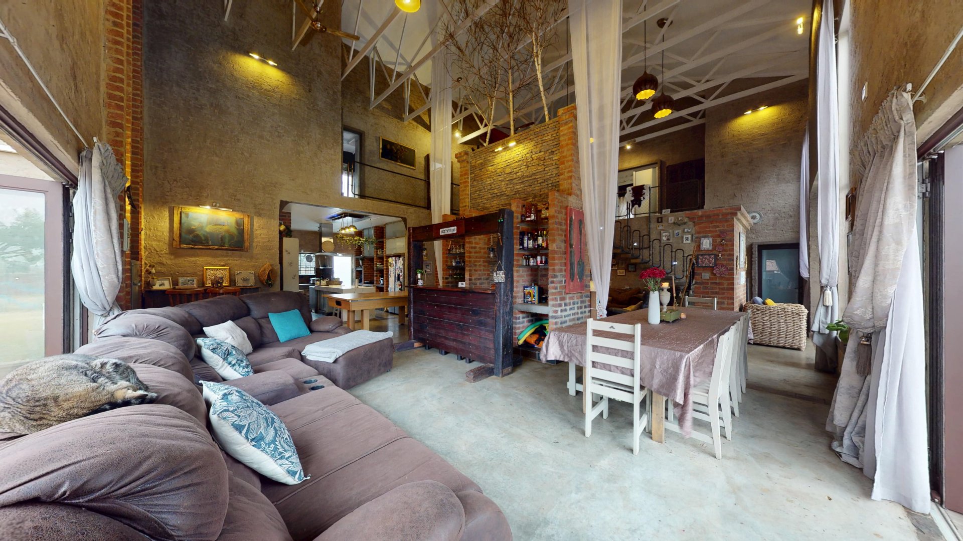 ENTERTAINING NOOK WITH DOORS TO POOL