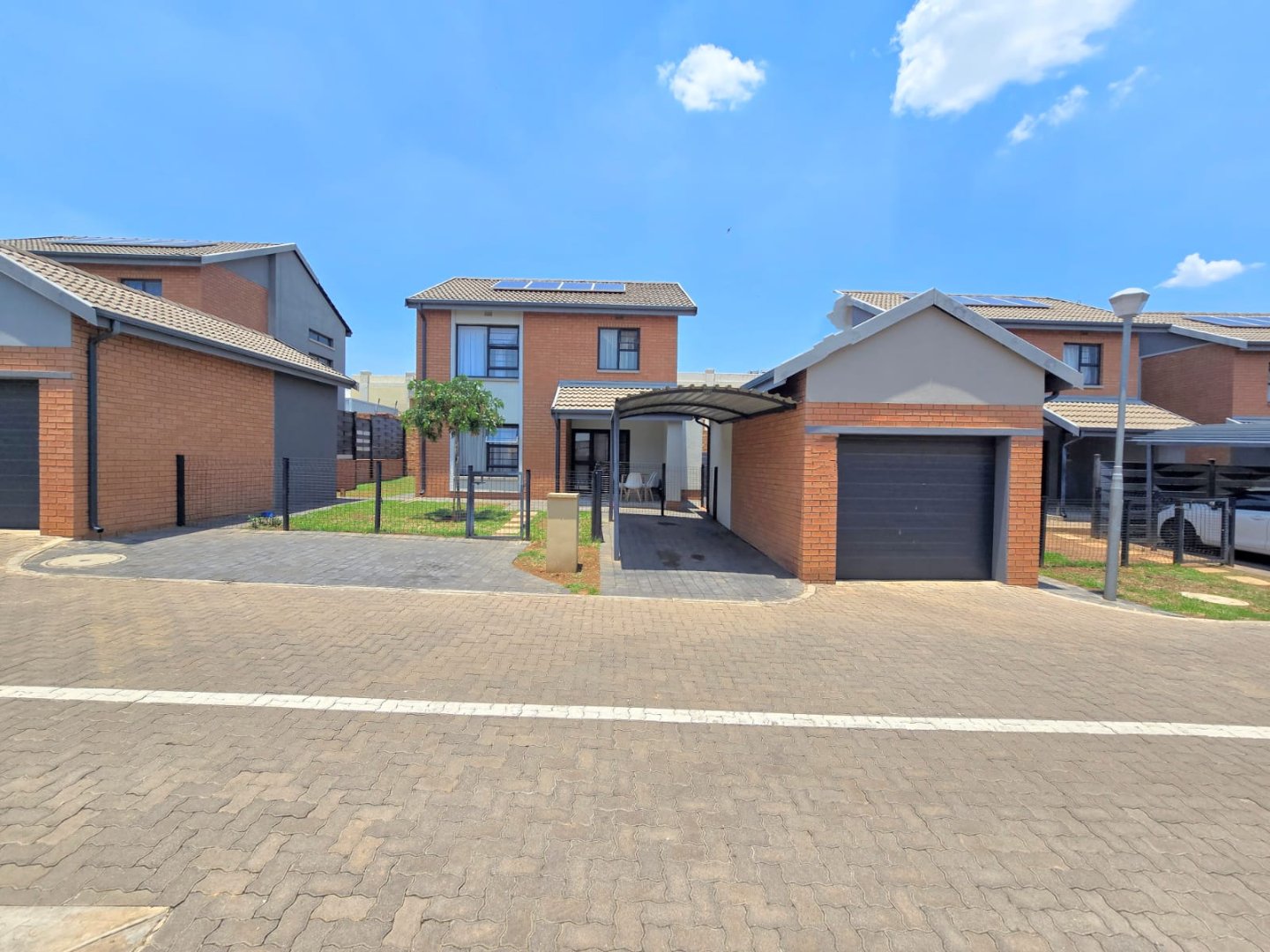 Stylish Duplex Living in Exclusive Zambezi Manor!