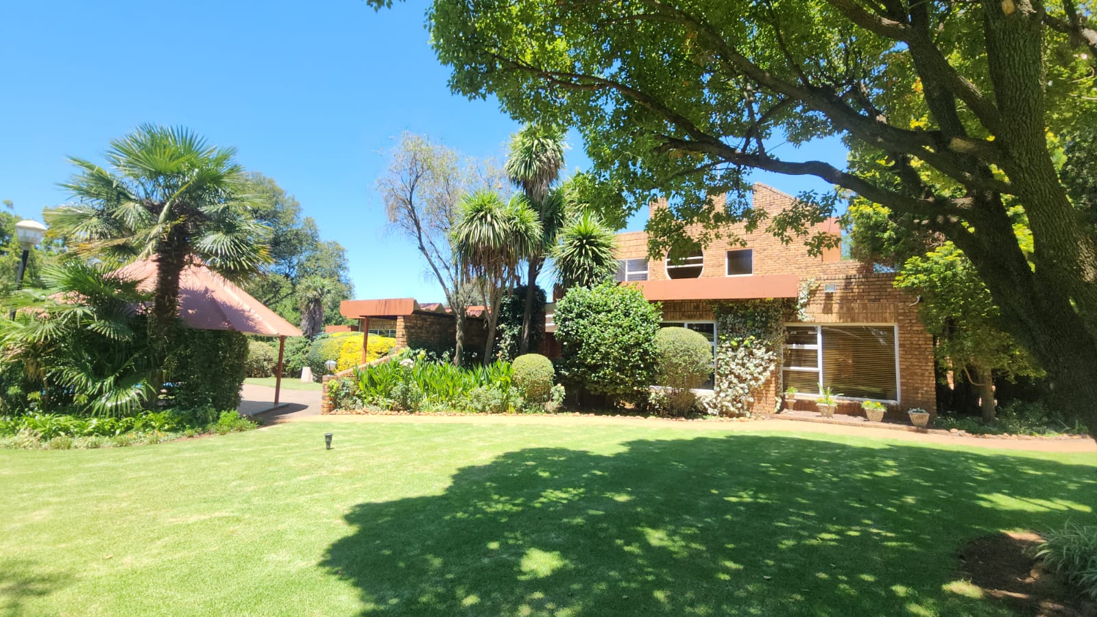 SIDE VIEW OF MAIN DWELLING