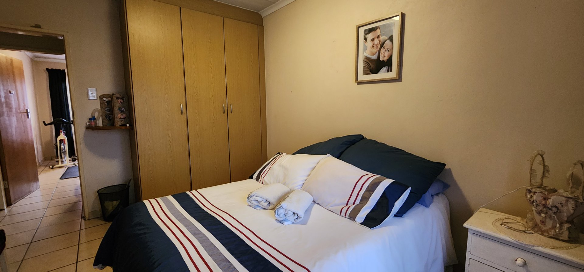 BEDROOM 2 WITH BUILT-IN CUPBOOARDS