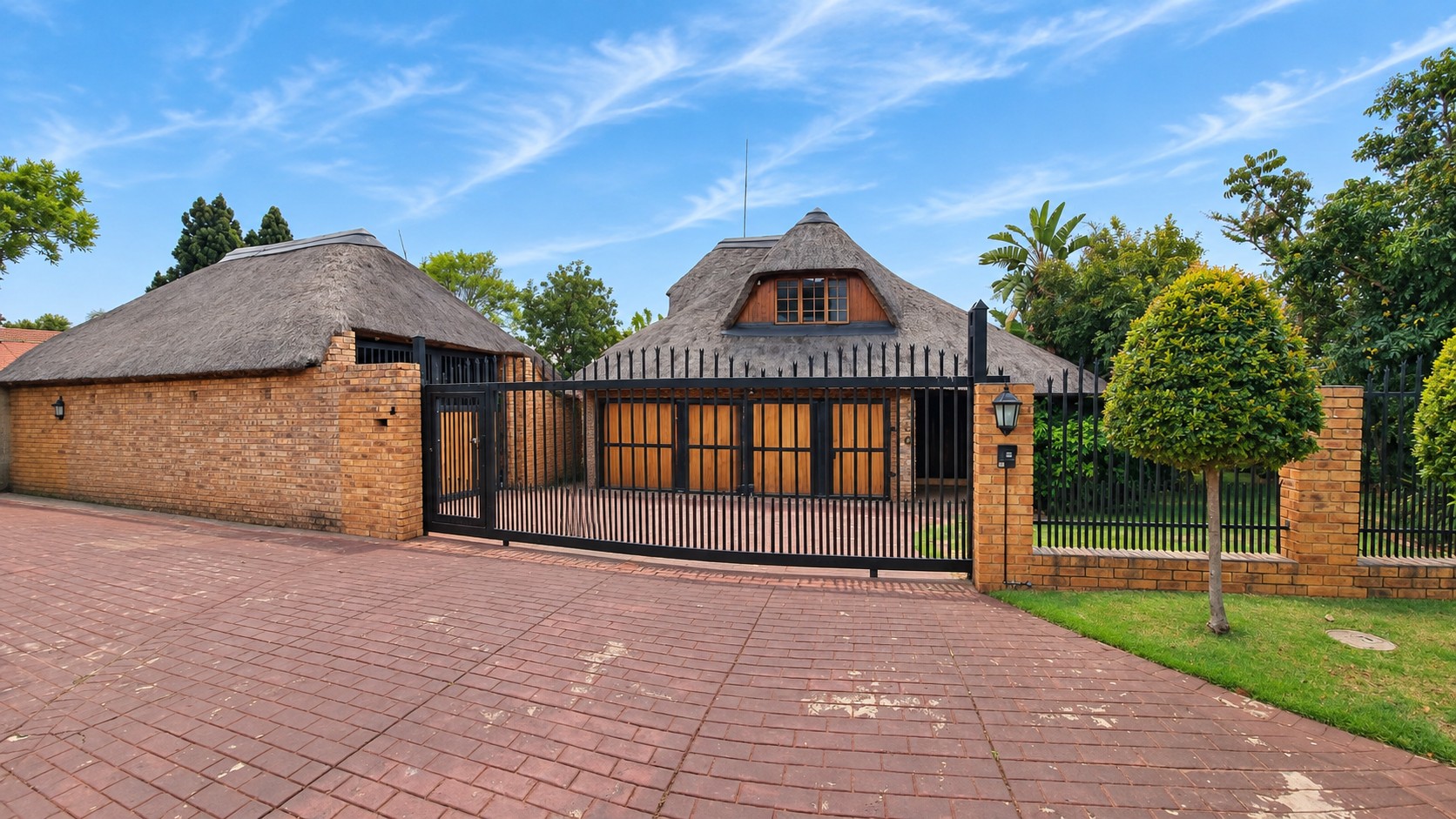 Character-Filled Thatched Home with a Pool, Lush Garden and Inviting Entertainment Areas