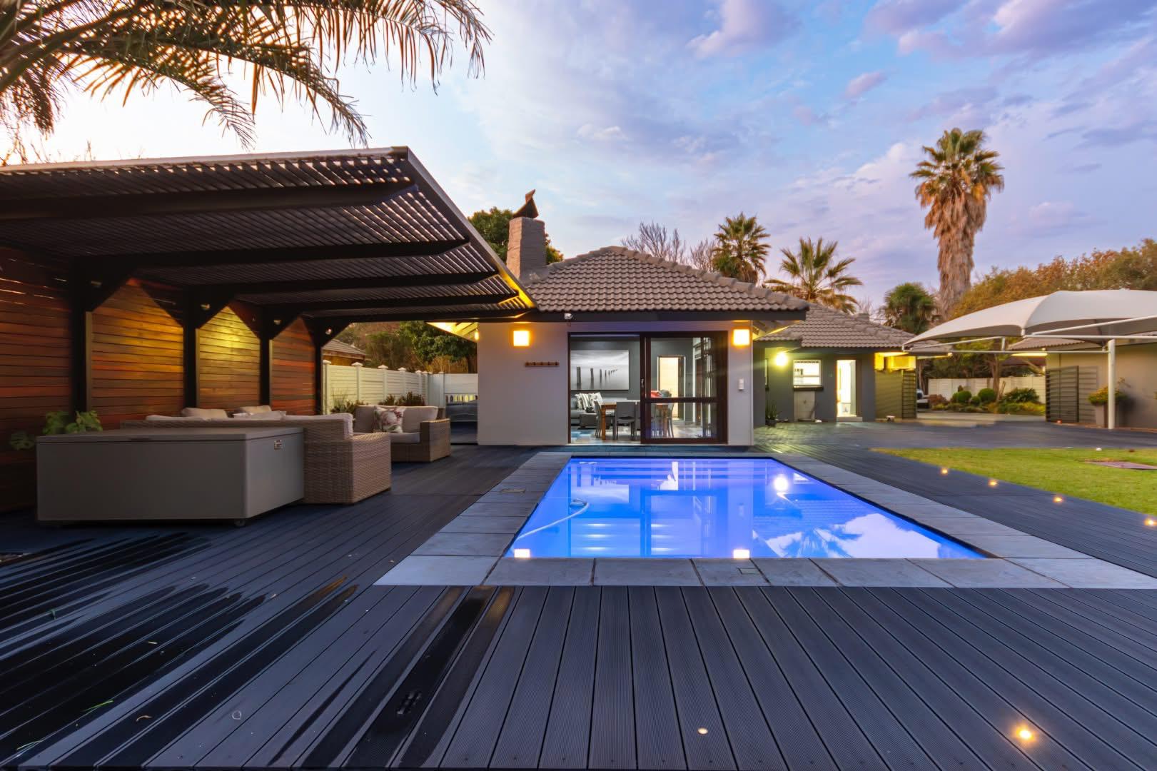 ULTRA-MODERN 4-BEDROOM FAMILY HOME WITH HEATED POOL & SOLAR