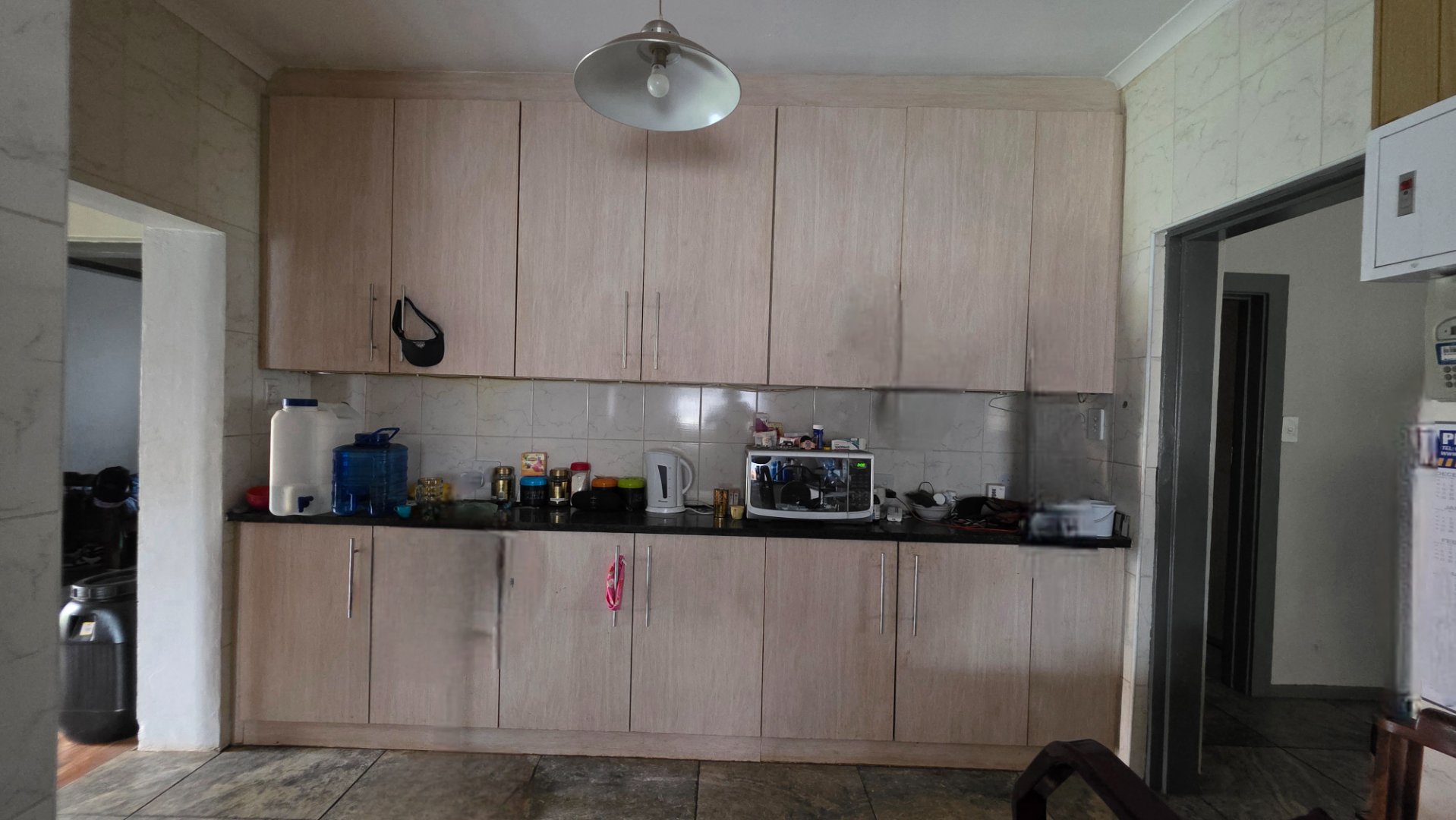 CUPBOARDS INKITCHEN OF MAIN HOUSE