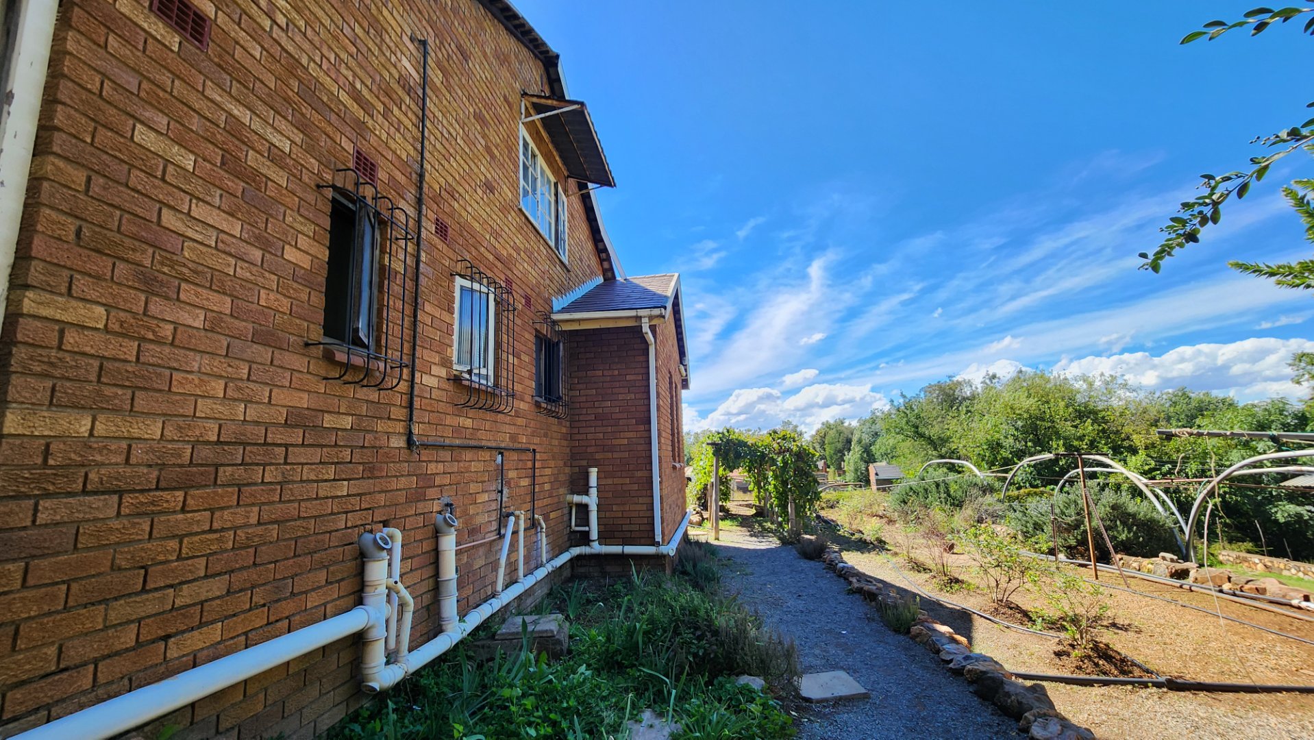 BACK VIEW OF MAIN DWELLING