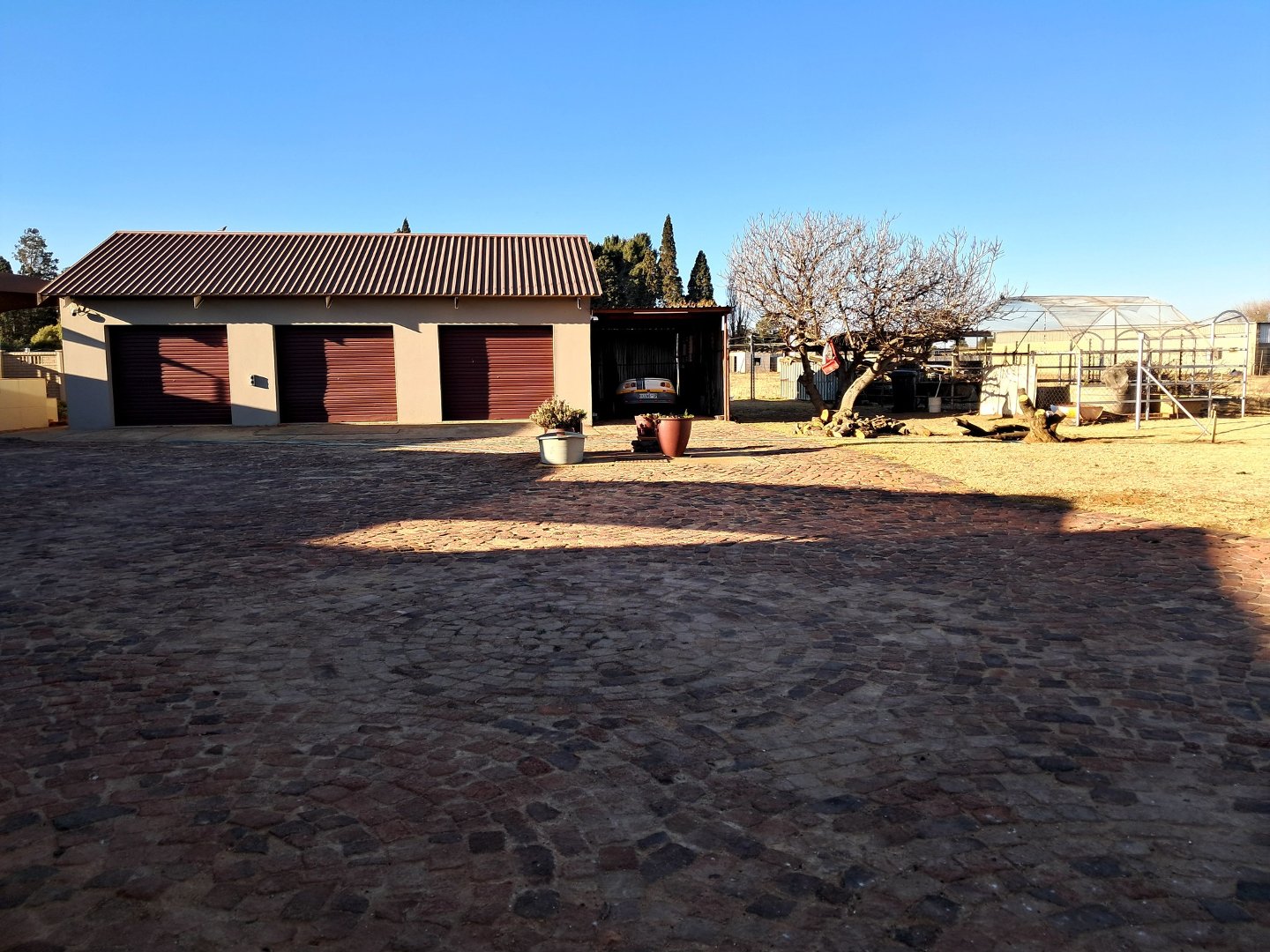THREE CLOSED GARAGES