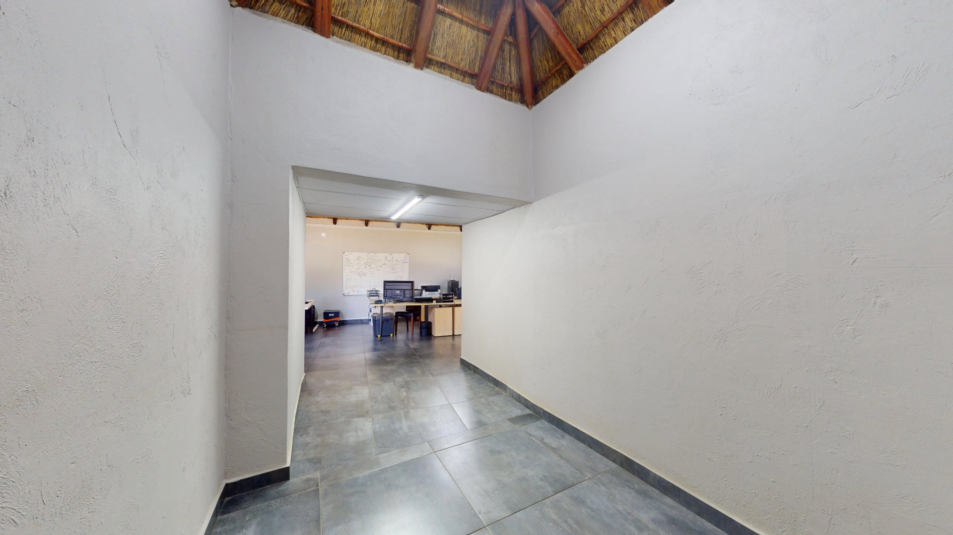 PASSAGE BETWEEN HOUSE AND OFFICE SPACE