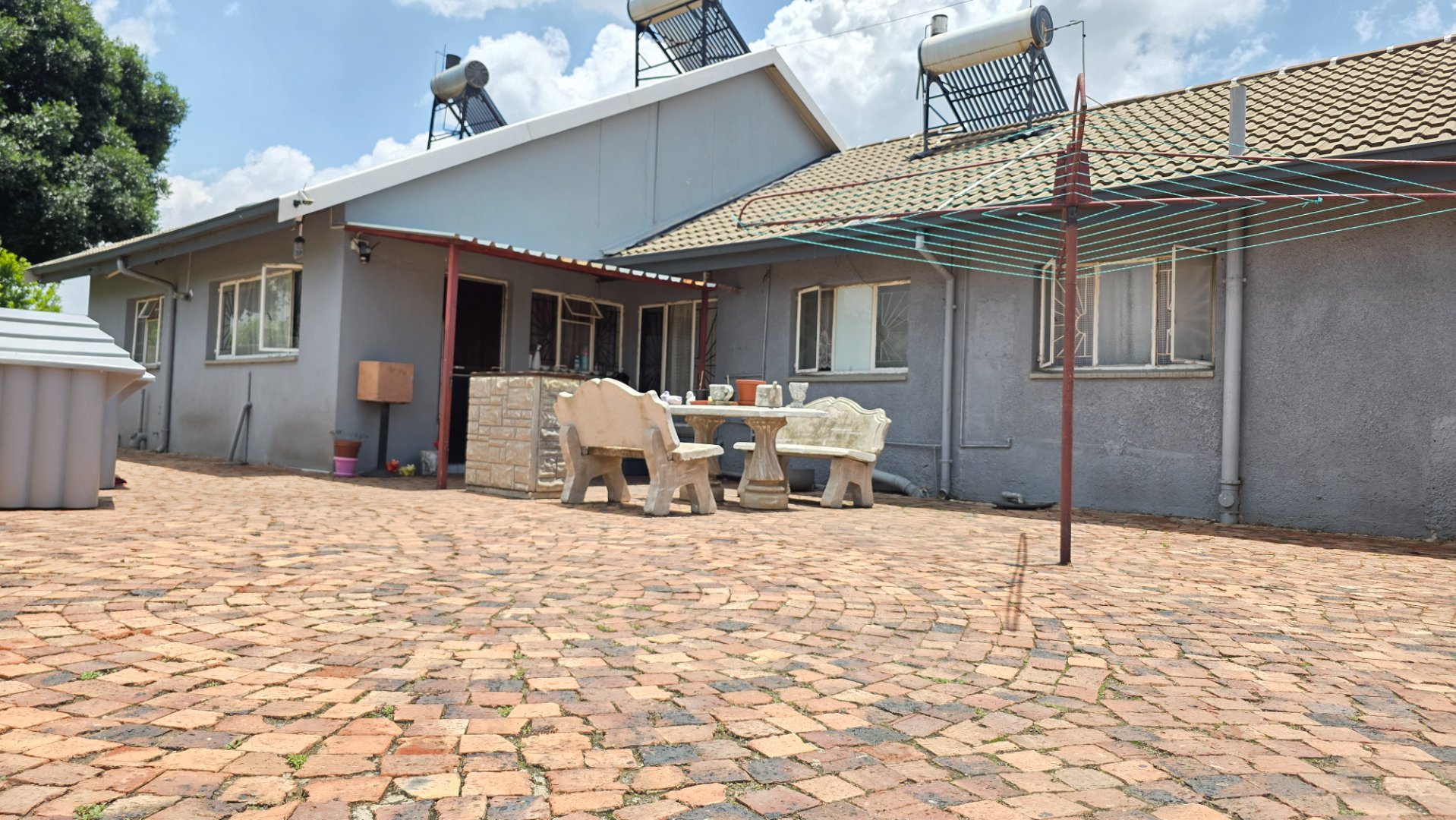 BACK VIEW OF MAIN DWELLING