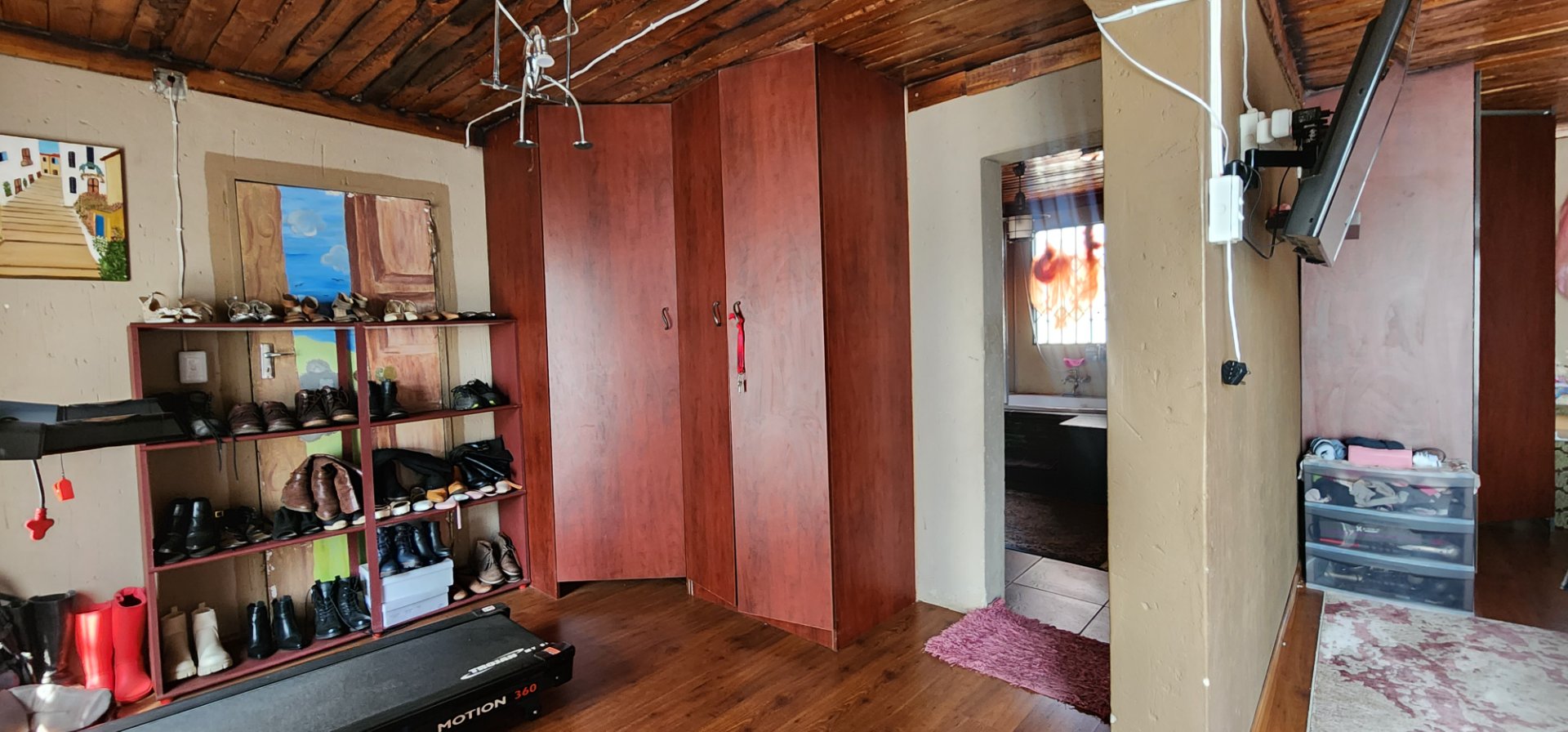 WALK IN CLOSET OF MAIN BEDROOM