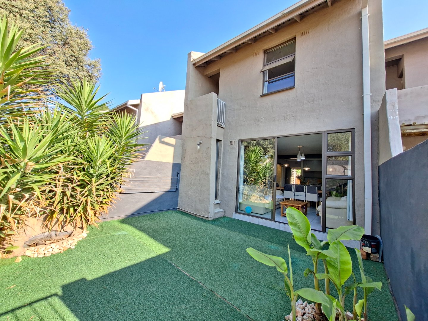 Modern Duplex Living by the Golf Course