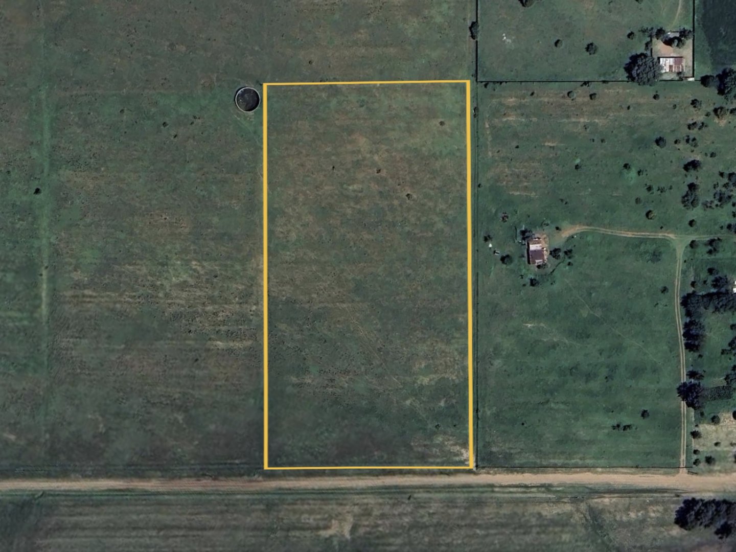 A VACANT STAND IN A TRANQUIL AREA WITH WALLING ON TWO SIDES