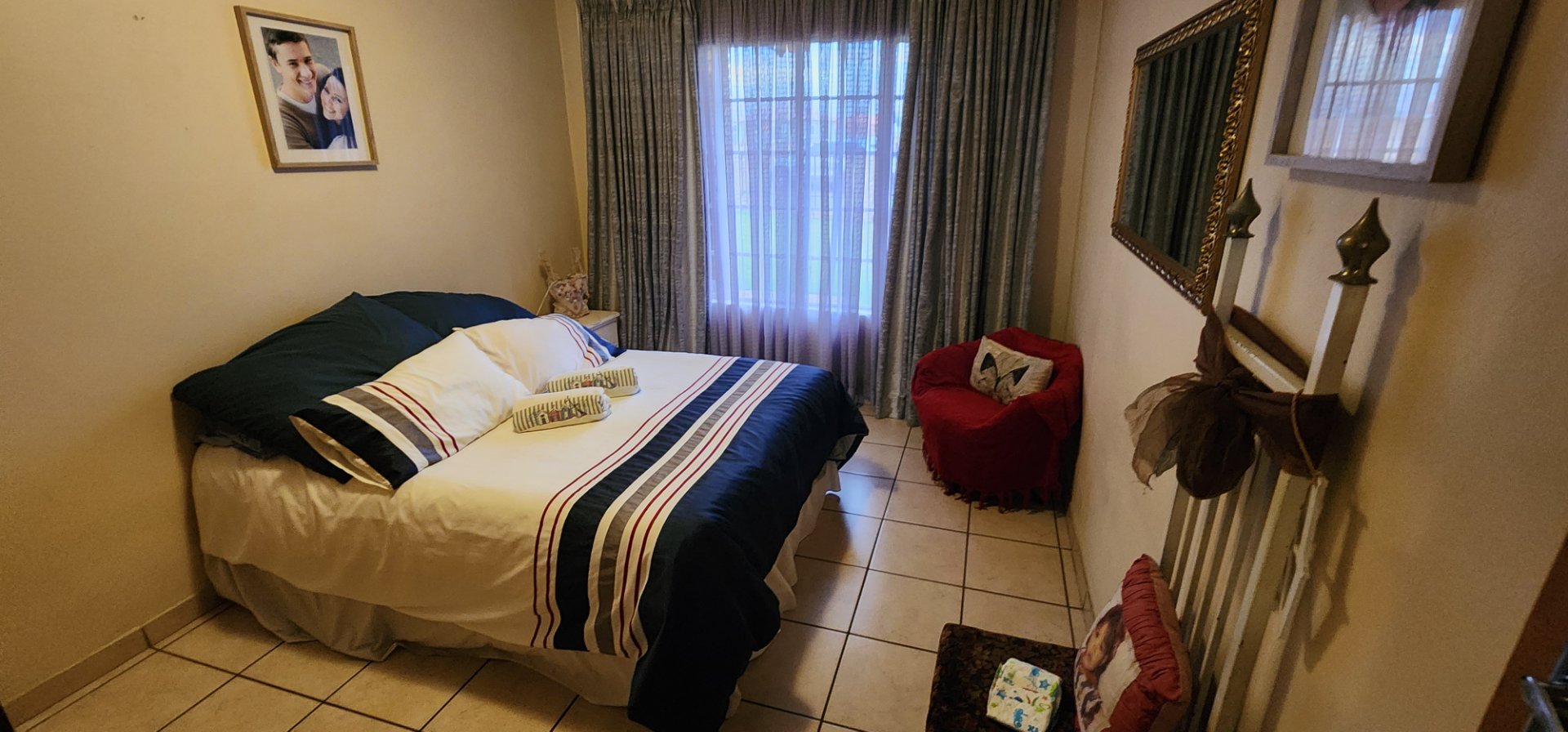 BEDROOM 2 WITH TILED FLOORS