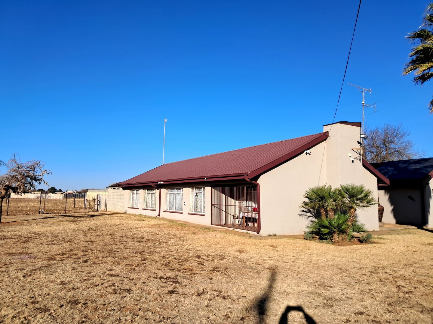 SIDE VIEW OF MAIN DWELING