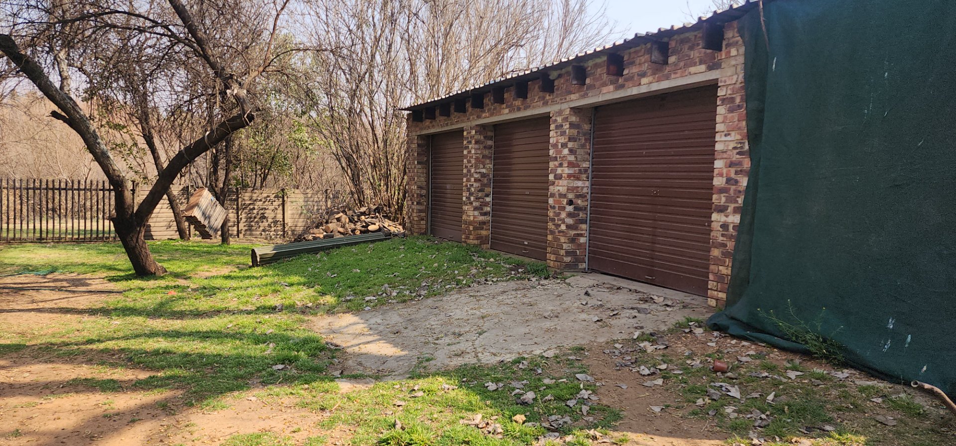 THREE GARAGES PLUS CARACVAN GARAGE