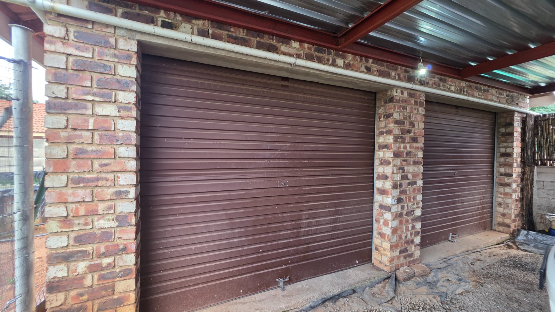DOUBLE GARAGES WITH CARRPORT AT MAIN HOUSE
