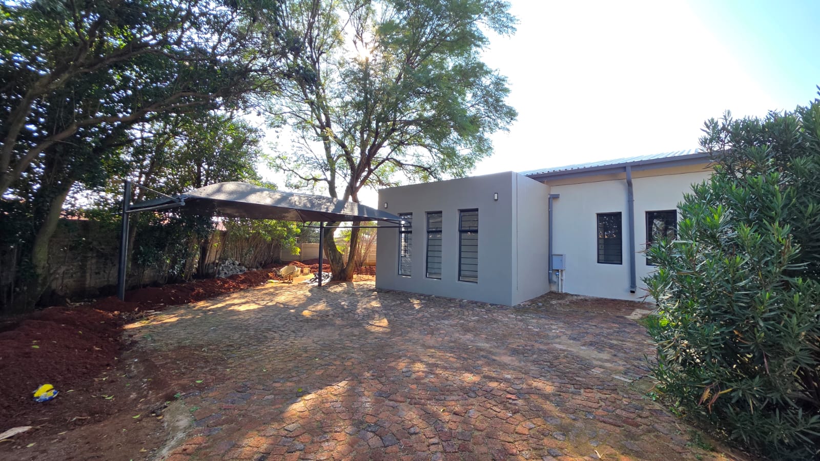 Private 2-Bedroom Garden Unit with Double Carport.