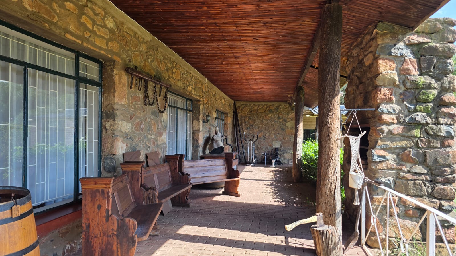 FRONT PORCH OF MAIN HOUSE