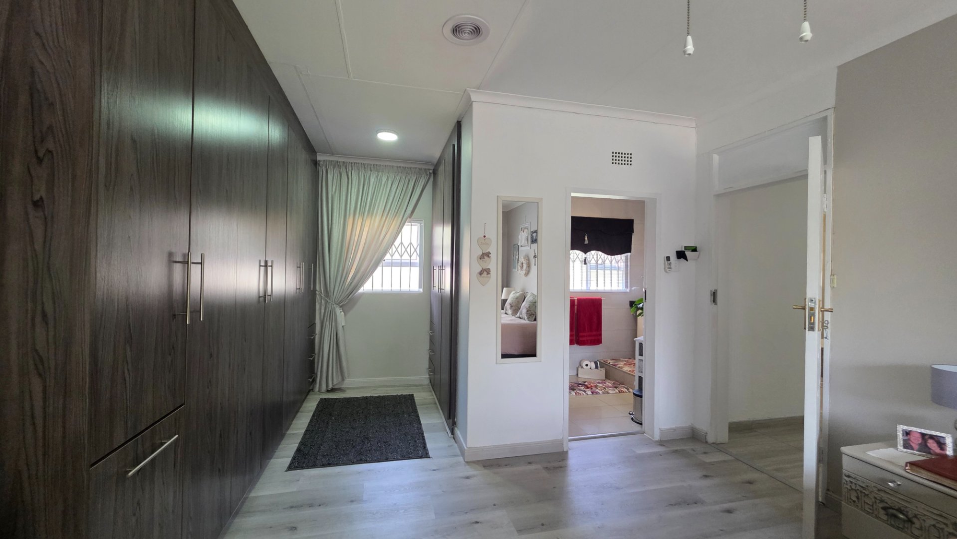 WALK IN CLOSET IN MAINBEDROOM