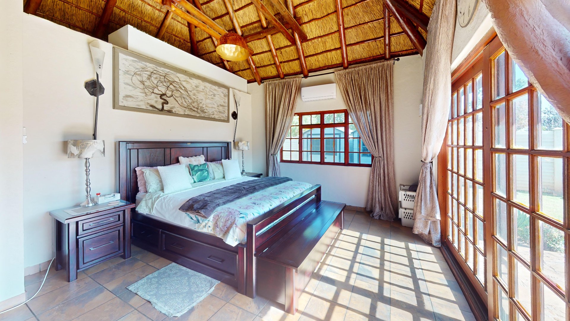 MAIN BEDROOM WITH SLIDING DOORS