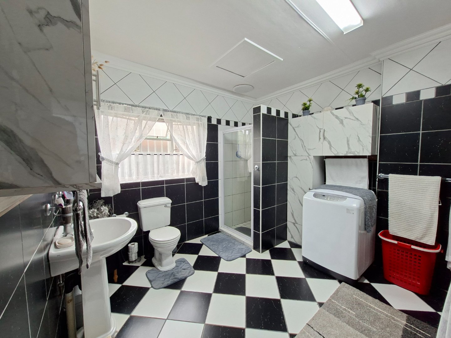 FULL BATHROOM WITH BATH AND SHOWER