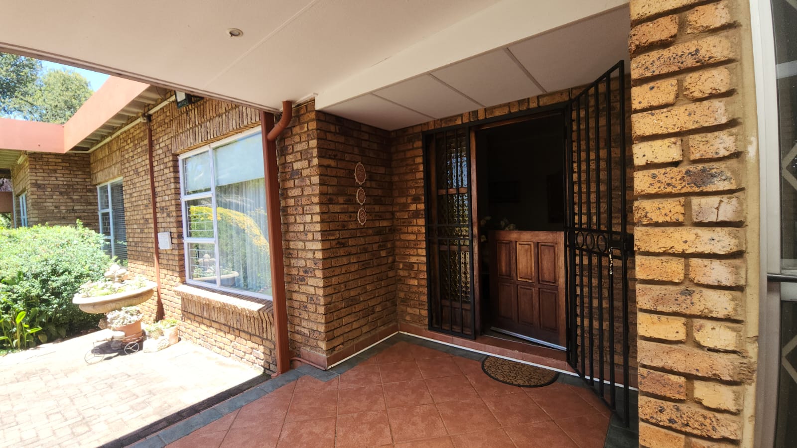 ENTRANCE FROM VERANDA INTOMAIN DWELLING