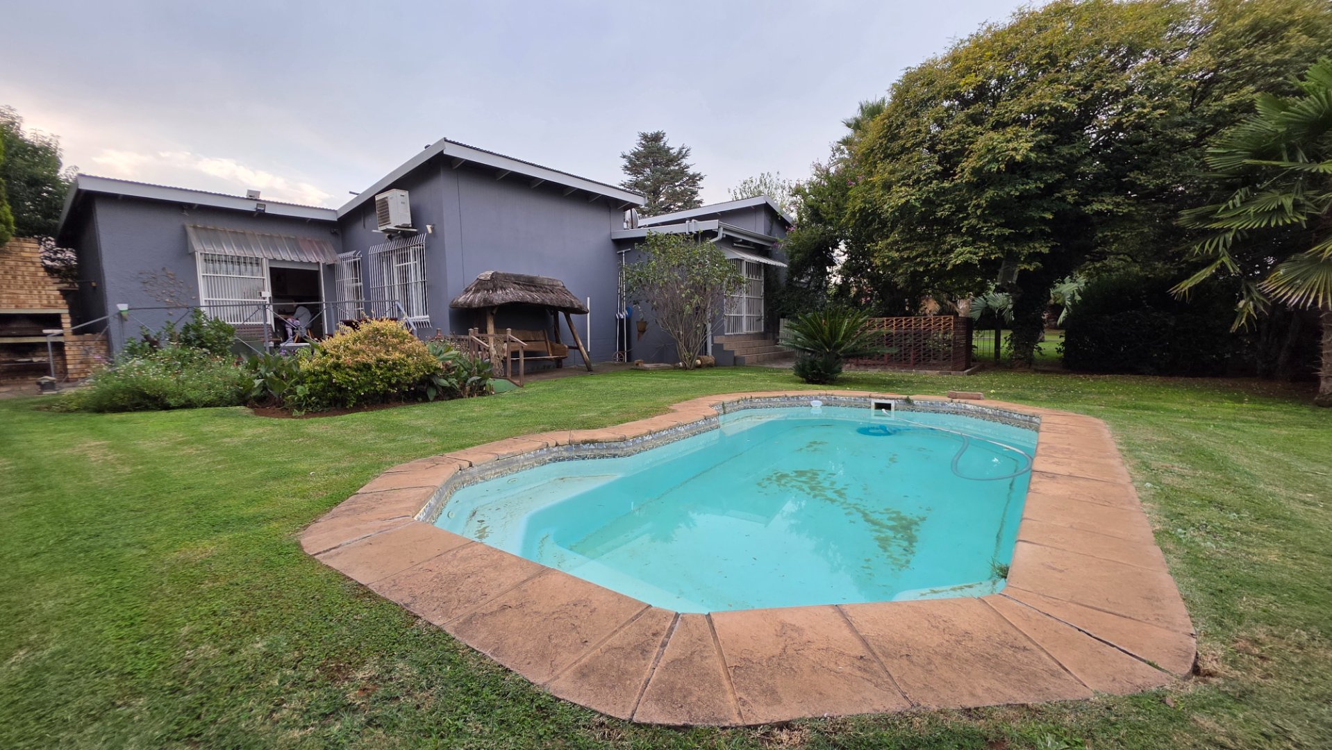 Where Family Living Blooms – A Stunning Home with a Garden Oasis & Pool”