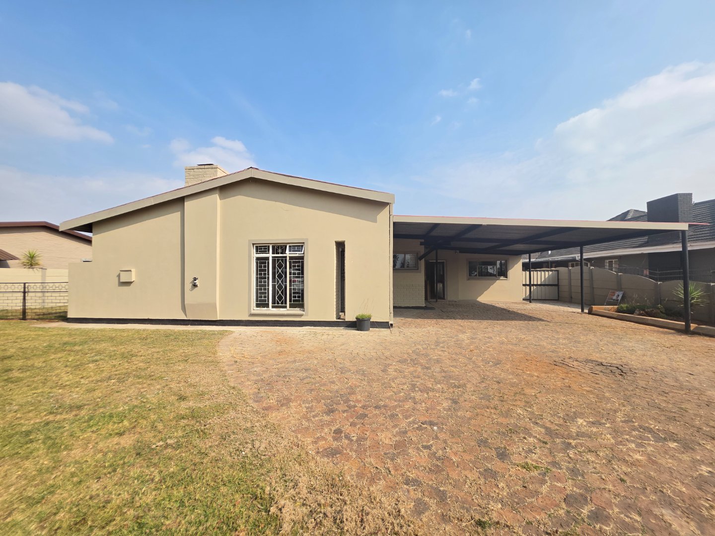 FRONT WITH  DOUBLE CARPORT