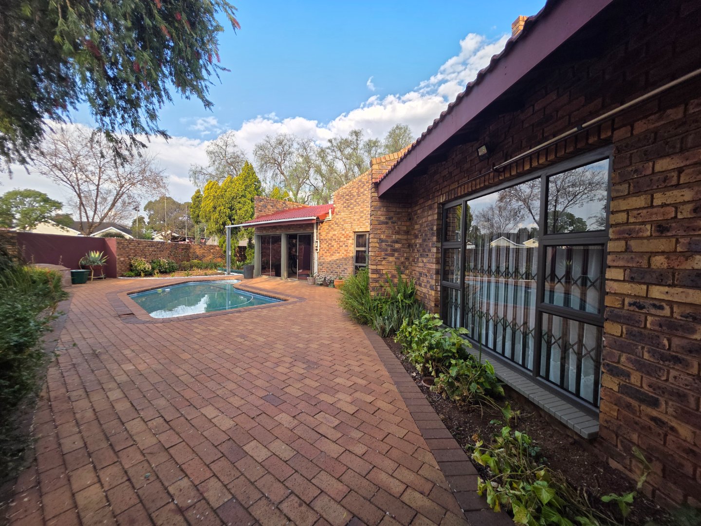 PAVED AREA SURRIUNDING TH EPOOL