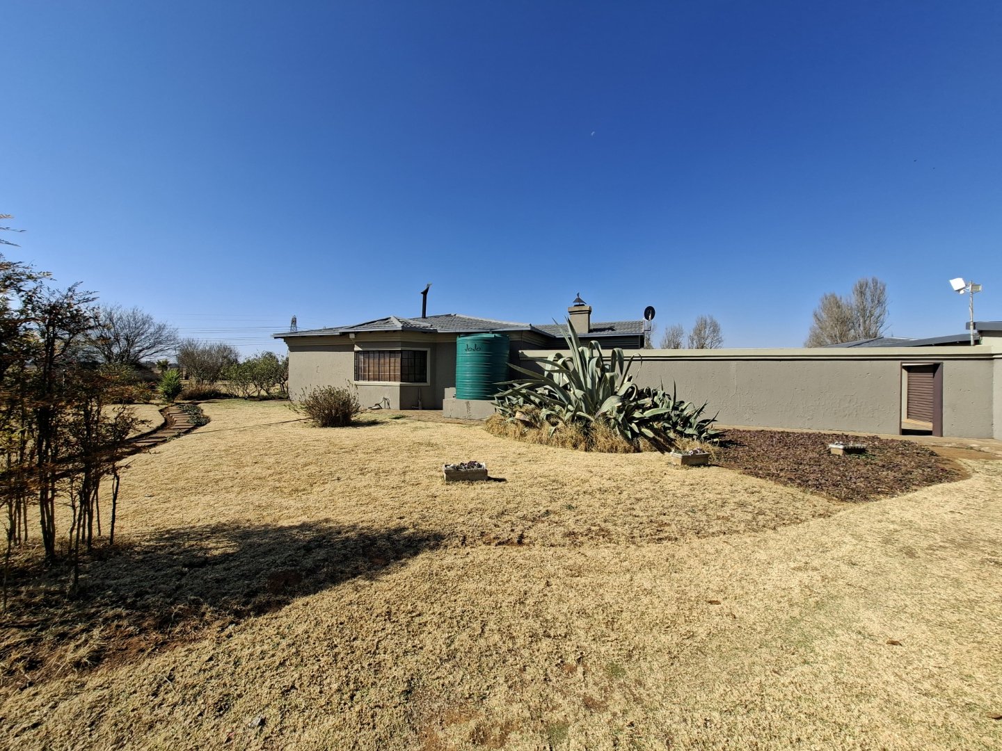 SIDE VIEW OF HOUSE