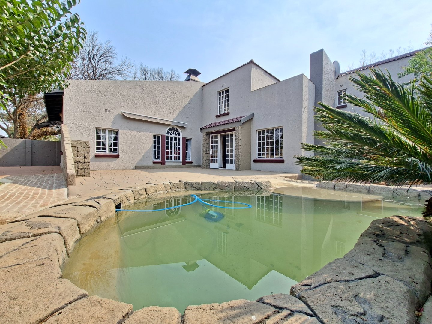 Elegant family retreat blending comfort, charm, and endless entertainment potential.