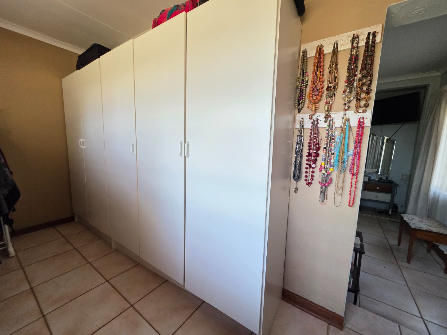 WALK IN CLOSET IN MAIN BEDROOM /HOUSE 2