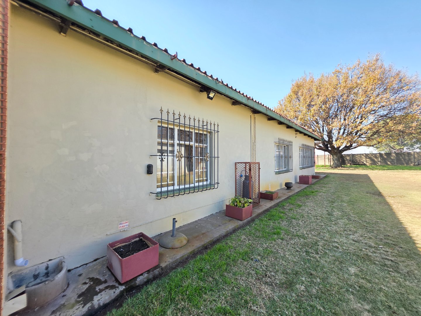 SIDE VIEW OF MAIN HOUSE