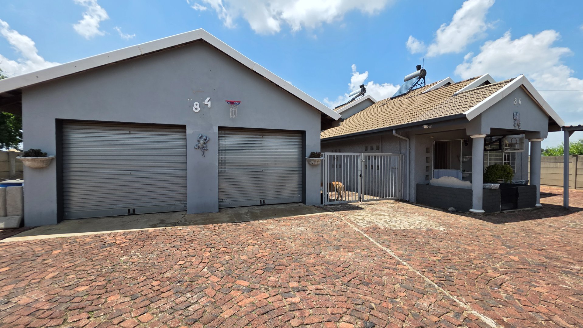 FANTASTIC INVESMENT OPPERTUNITY AS THIS PROPERTY CONSISTS OF  MAIN DWELLING AND TWO FLATS TO BE RENTED OUT.
